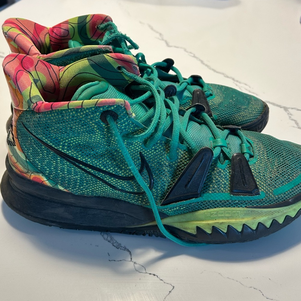 Nike “Kyrie Weatherman” basketball sneakers.